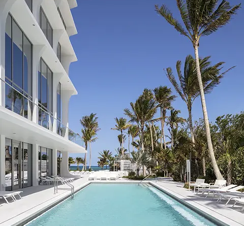$3.2M mansion's rec areas, indoor pool and palm trees beckon