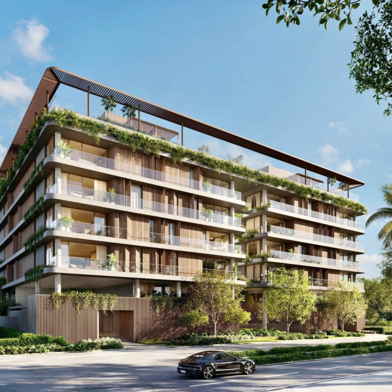 A peaceful coastal streetscape in Miami showcasing a South Brickell luxury condo area during golden hour.