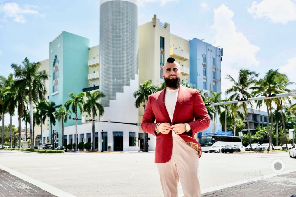 Street view of a modern South of Fifth commercial property in Miami Beach with clean sidewalks and palm trees.