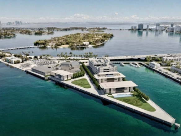 MacArthur Causeway in Miami Beach near luxury condo towers and waterfront waters.