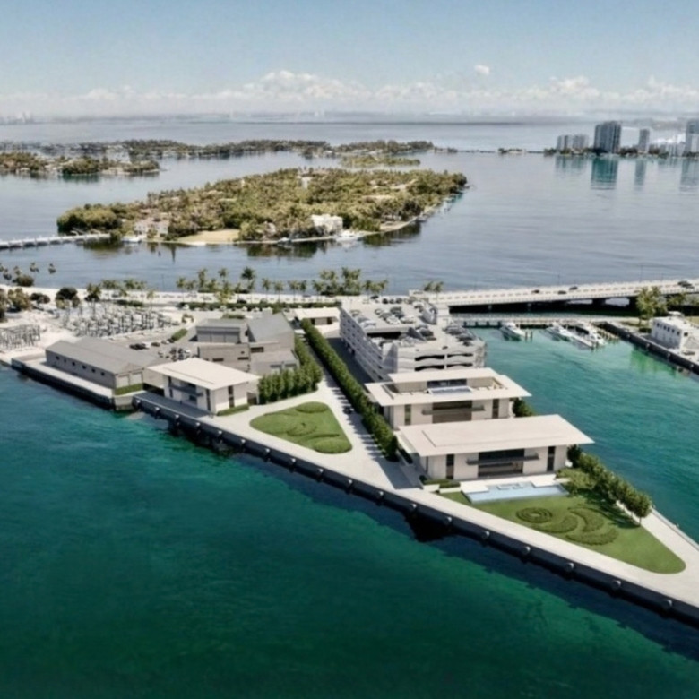 MacArthur Causeway in Miami Beach near luxury condo towers and waterfront waters.