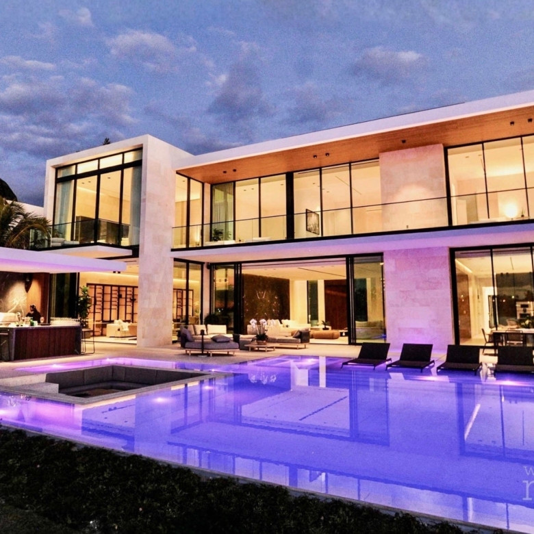 Coastal waterfront estate neighborhood reflecting South Florida luxury home sales growth