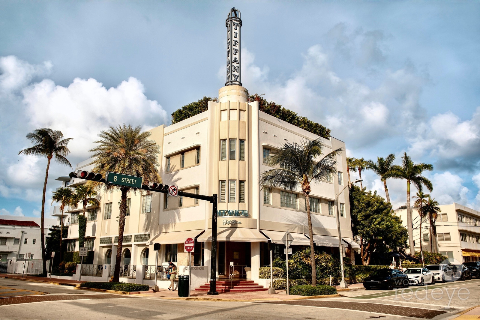Historic Art Deco streetscape on Collins Avenue following a South Beach hotel sale.