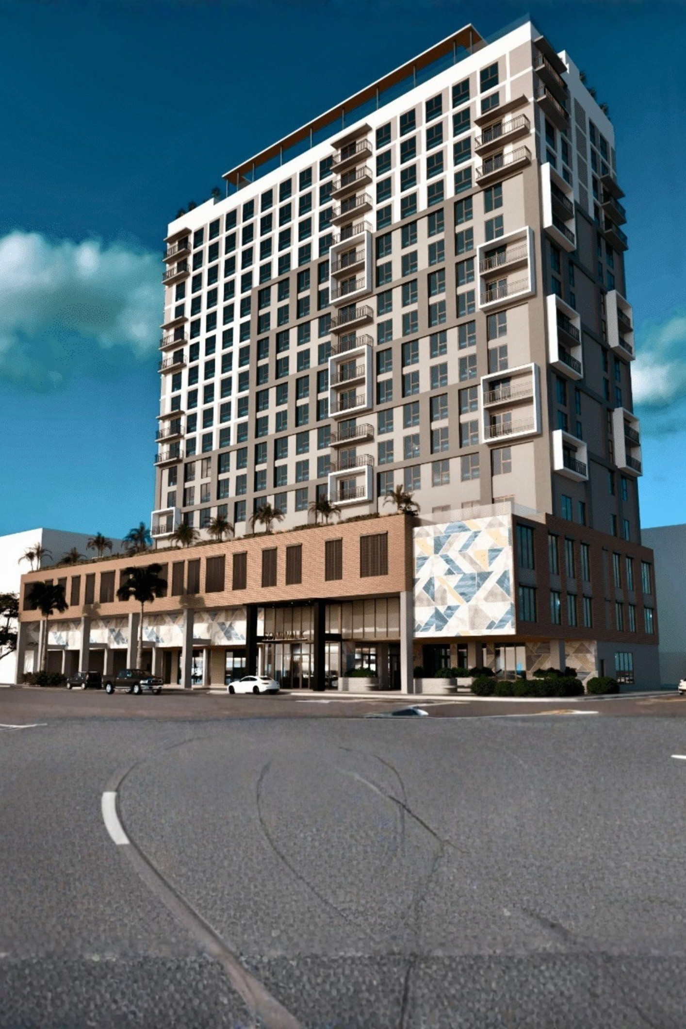 A bright daytime street view of the urban transit area near the future South Miami student housing development.